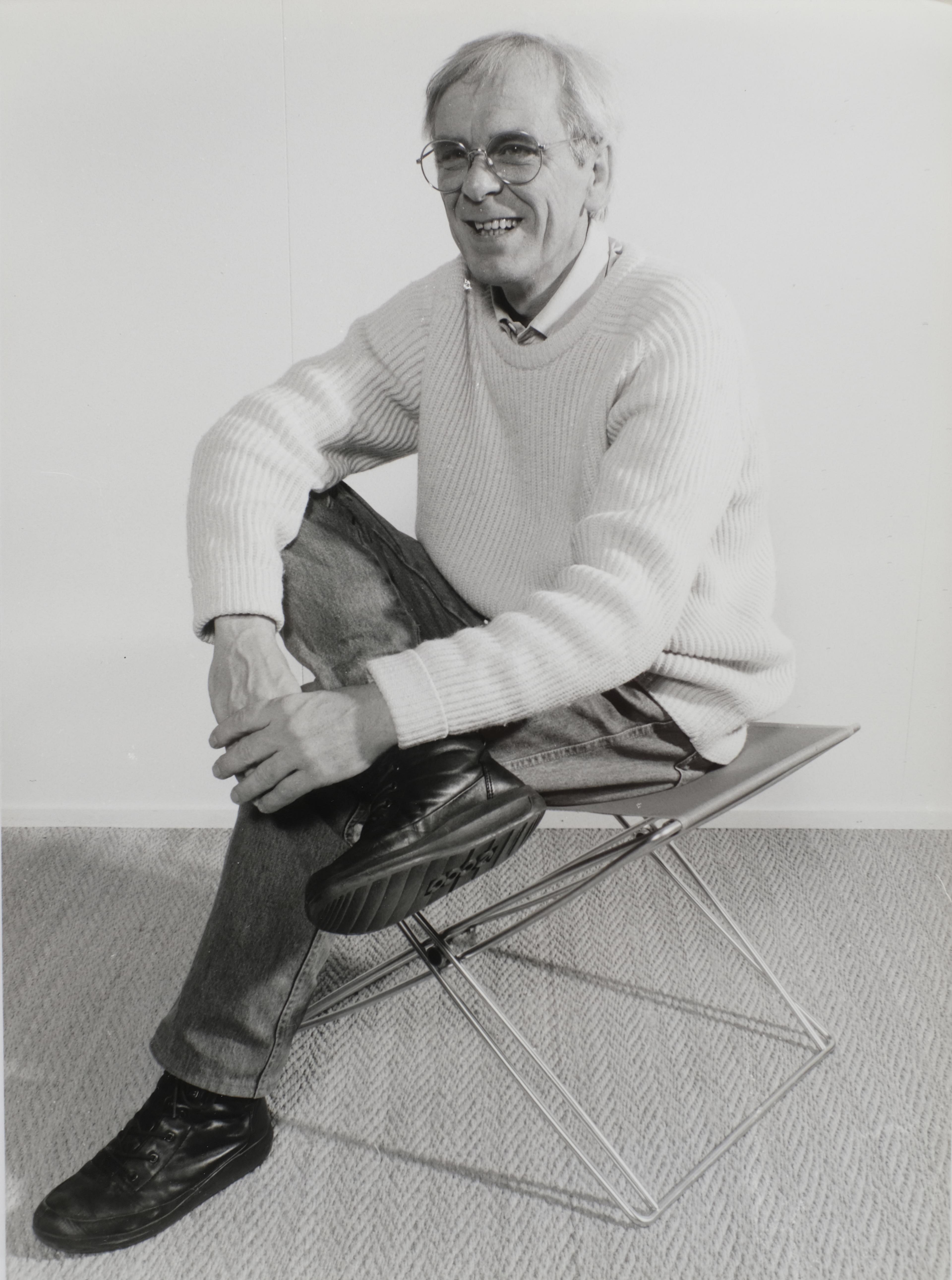 Jørgen Gammelgaard sitting on The JG Folding Stool