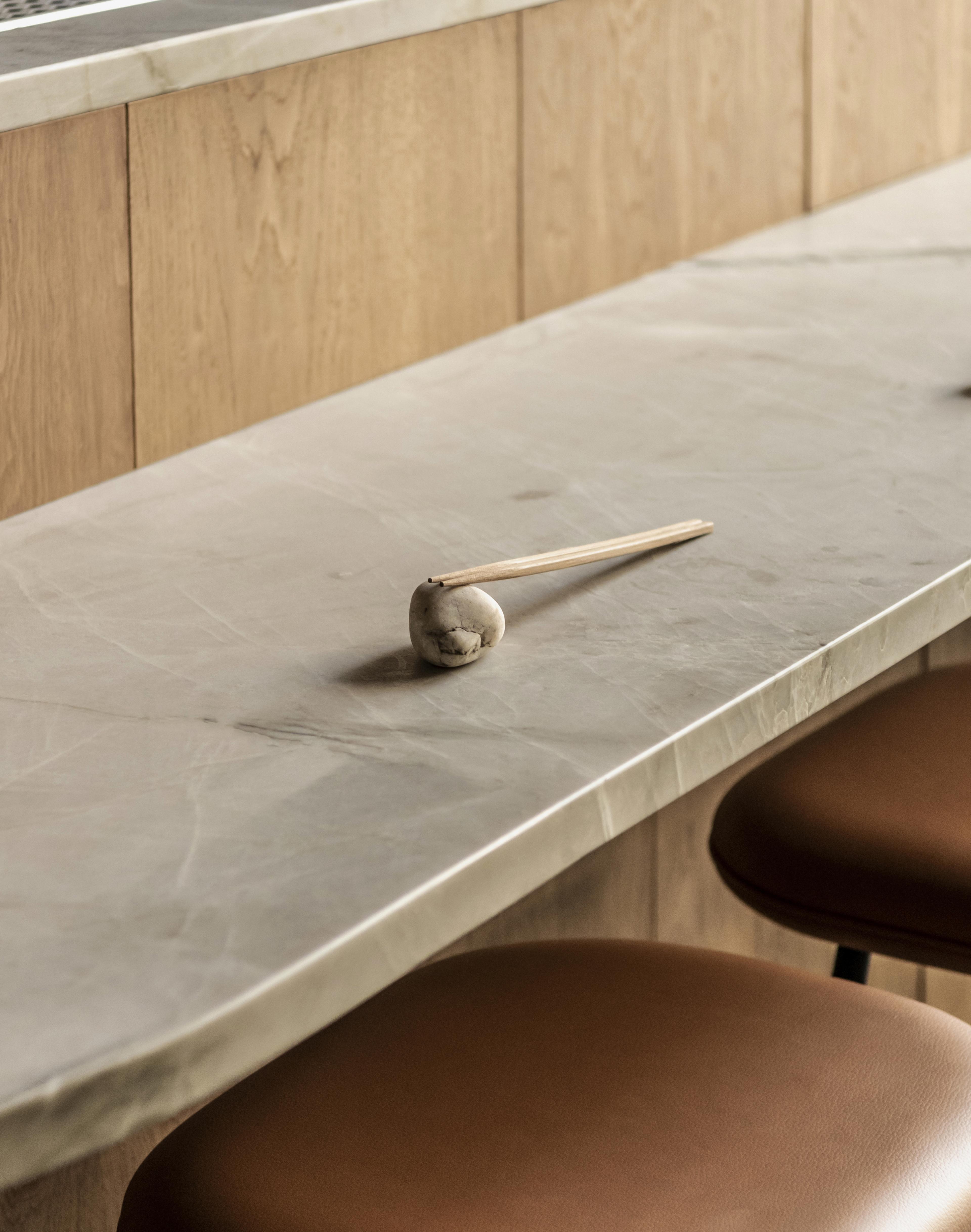 Spine Stool with leather seat by Space Copenhagen in Sticks'n'sushi London