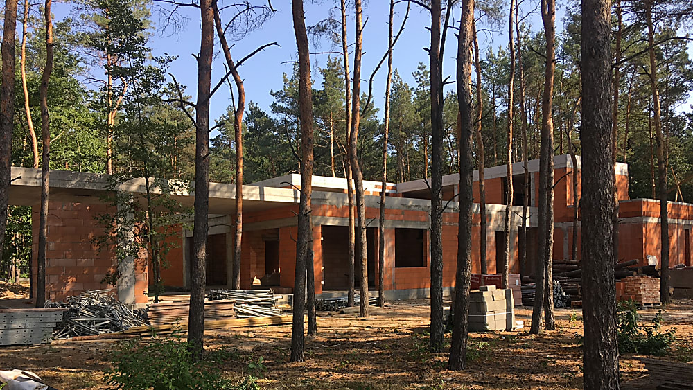 Główne zdjęcie projekty dom w lesie