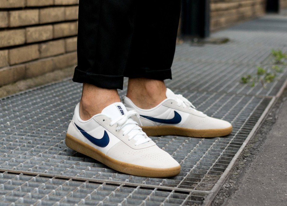 white and blue nike sb