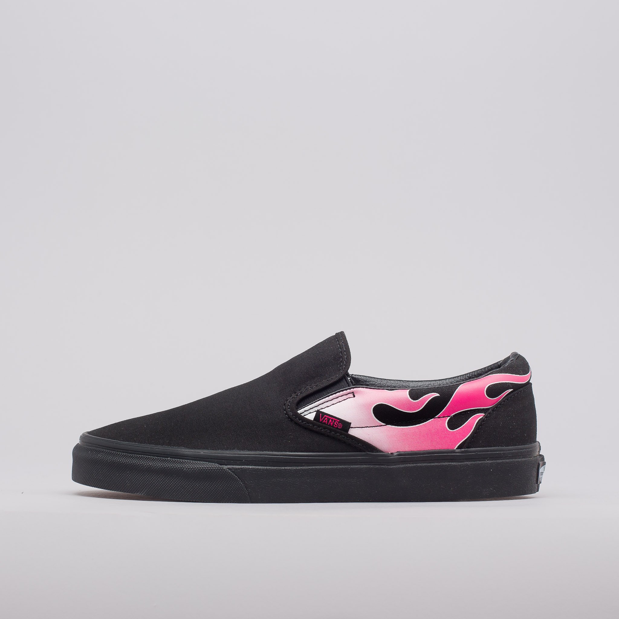 Black slip on vans with pink flames hotsell