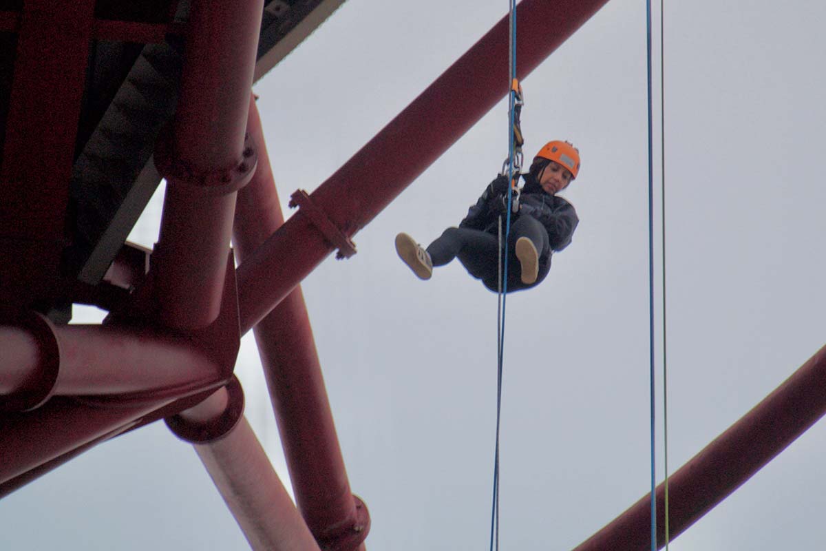 Fieldfisher and 12KBW abseiling from the ArcelorMittal Orbit in Stratford, London