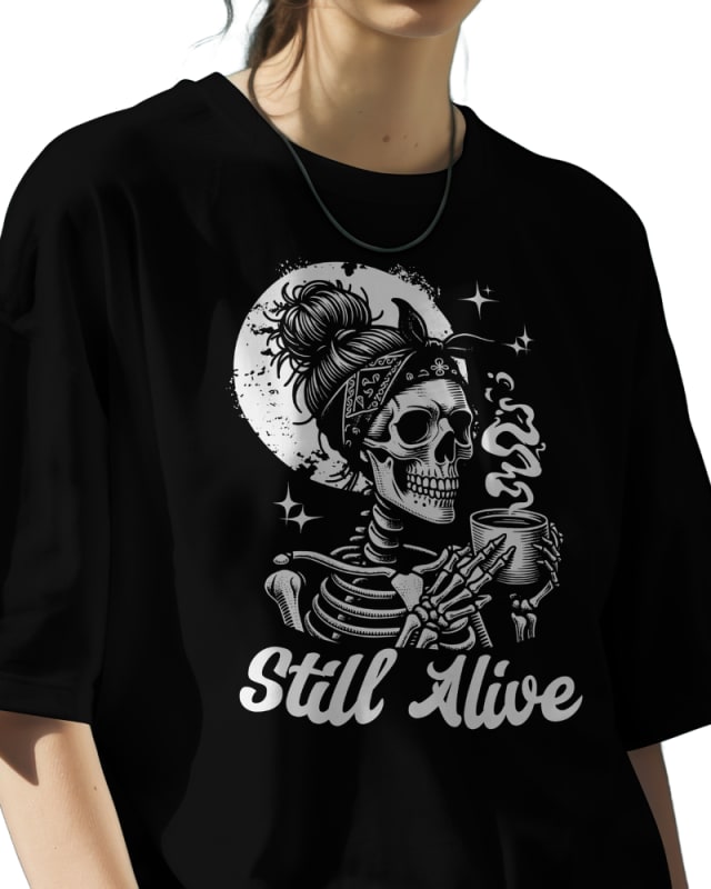 Camiseta oversize negra de algodón con diseño de esqueleto y texto Still Alive