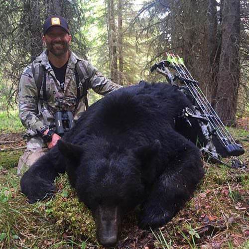 Who wants to book a spring bear hunt? Cameron Hanes has had plenty of success. #Hunting #Bear #HamerOn #FinandField #Adventure