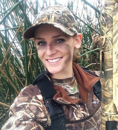 Amber sure looks happy waterfowl hunting. Share your happy hunting photo's at myadventures@finandfield.com. #Hunting #Happy #Adventure #FinandField