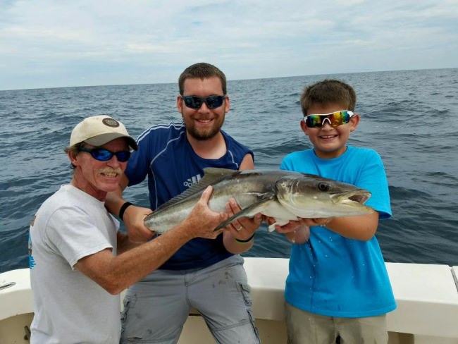 Awesome morning aboard the Kat-cha later with Jayson Plummer  catching his first king mackerel and helping reel in two nice cobia that unfortunately we had to release king bite was on fire with 15 kings and a handful of big Spanish