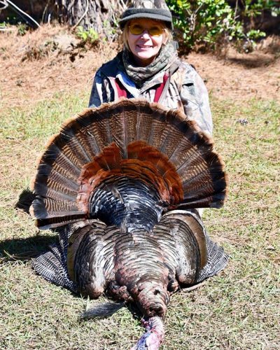 Ms. Lynn killed her best Eastern turkey this morning-21.6#/11 3/8” beard/1 1/4” spurs.  Her hunt lasted 7 minutes! This was my 100th guided turkey.  What a day! #redblufflodge #scturkeyhunting @kuiu_official @ Red Bluff Lodge