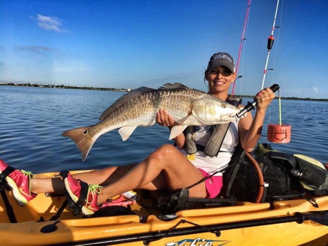 Have you ever fished in a kayak? Sandra getting it done. #Fishing #Kayak #Adventure #FinandField