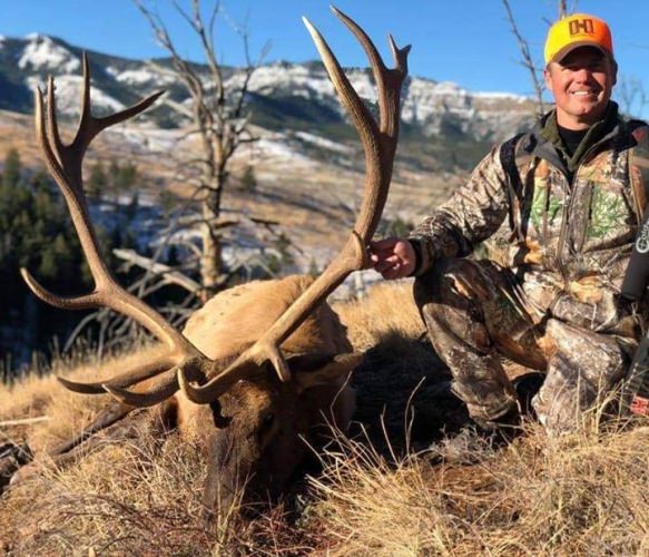 Greg got it this beast hunting with Wood River Ranch. Don't miss out. Book a hunting adventure today. #Elk #Hunting #FinandField