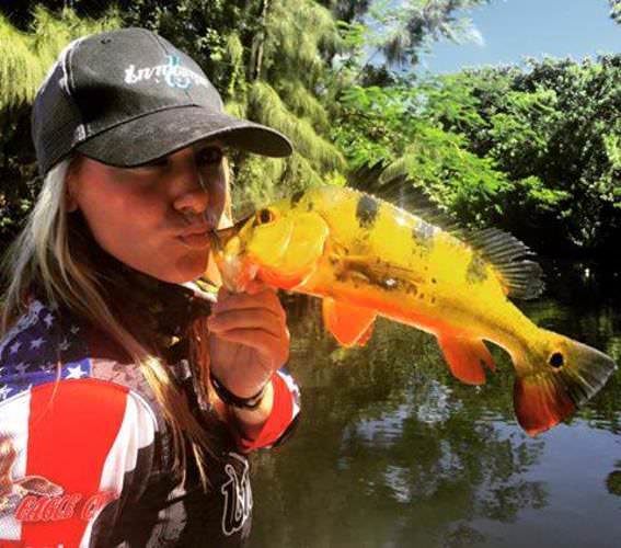Larysa Unleashed showing off a nice peacock. #Fishing #Adventure #FinandField