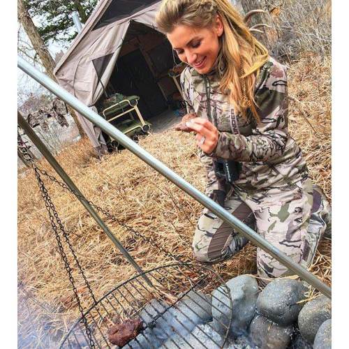 Campfire cooking! What is your favorite campfire meal? #EvaShockey #UAhunt #Hunting #Adventure #FinandField