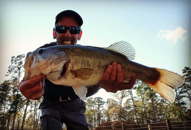 What do you think of the pure excitement on this anglers face? Great photo from Bluejack National! #Fishing #Golfing #Adventure #Texas #FinandField #Bluejack