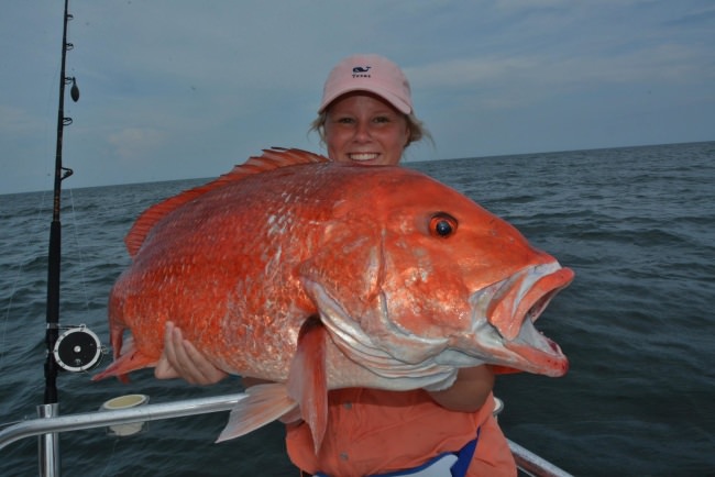 31 lbs Red Snapper made this lady angler smile. #Fishing #OrangeBeach #FinandField #Bama #RollTide