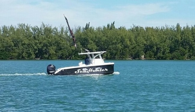 Which is the best caption for this SeaHunter Boats?
1) Divorce settlement
2) Optical illusion
3) Unsinkable
#MIBS2016 #FinandField #Adventure #Miami #SeaHunterBoats