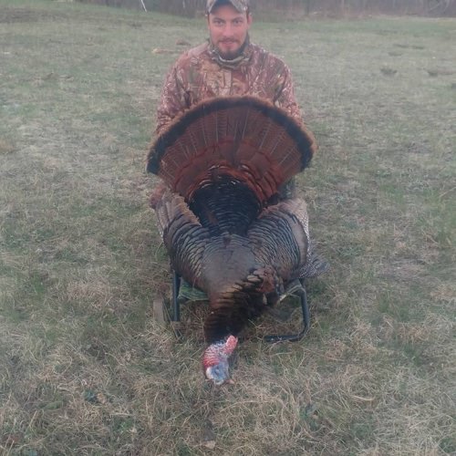 After a couple of hard days hunting Zach Mowers got his first turkey. A 9 3/4 inch beard 3/4 inch spurs. Not bad for your first turkey.
