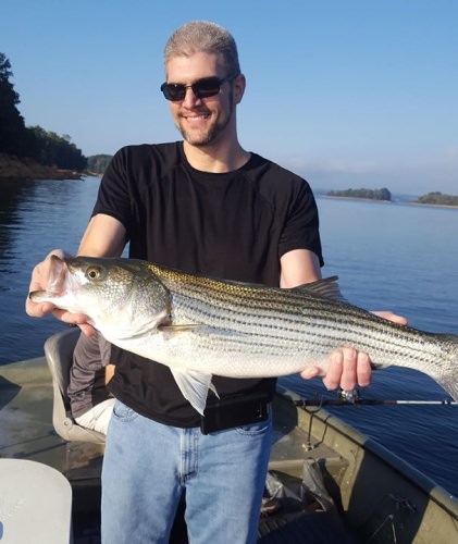 Thanks to Bill Burke for his continued patronage of StriperFun Guide Service.  Check out his son Brandon with a nice Cherokee Lake Striper! 

For all the readers out there you can learn more on our website www.striperfun.com or you can read our fishing reports for LAKE CUMBERLAND at http://www.fishin.com/forums2/content.php/7104-CAPTAIN-JIM-S-LAKE-CUMBERLAND-FISHING-REPORT or for The CUMBERLAND RIVER at http://www.fishin.com/forums2/content.php/7103-CAPTAIN-JIM%E2%80%99S-CUMBERLAND-RIVER-FISHING-REPORT or for DALE HOLLOW LAKE at http://www.fishin.com/forums2/content.php/7062-THE-DALE-HOLLOW-FISHING-REPORT