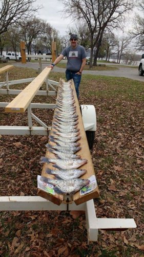 Mark and I on his second day on Lake Eufaula .  Fish are spawning but not everywhere it's spotty. But when you find them it's worth the hunt. Seek and destroy is the pattern name we came up with. Thanks for your time Mark. #lakeforktackle is the best plactic I have used so far for crappie.