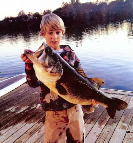 Young Grant breaking records with his 13.5 lbs largemouth bass in Austin, TX. #Fishing #FinandField #Austin #Texas #Hookem