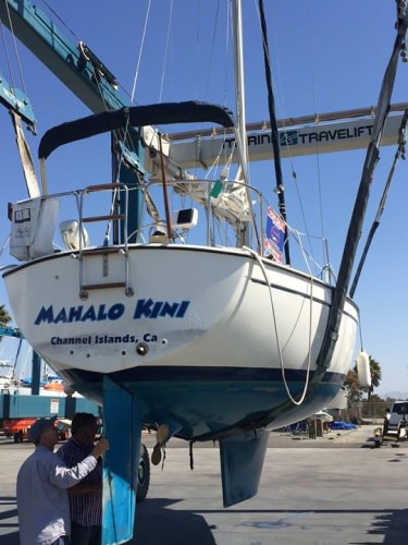 The Pearson 303 "Mahalo Kini" is up in the slings for survey today!