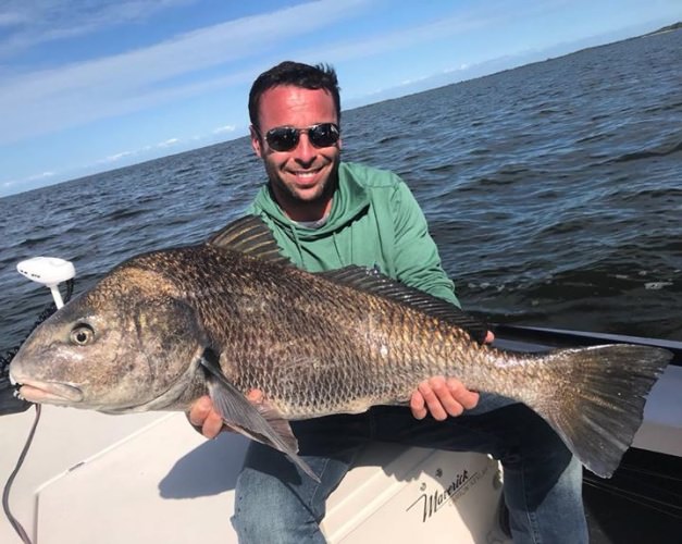 Justin with his big old blackie! #blackdrum  #portcanaveral #slightlyobsessed #getslobbed #deepseafishing #nearshorefishing #inshorefishing #fishingcharters #flatsfishing #spacecoast #florida #mbgboats #maverickboats #pathfinderboats #fishthelegend #minnkotamotors #yeticoolers #rcioptics #powerpole #suzukioutboards