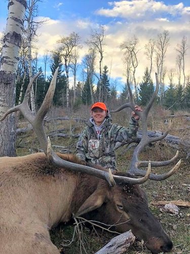 Bravo to Amy on her 1st bull Elk ever! Wood River Ranch #Hunting #Elk #FinandField