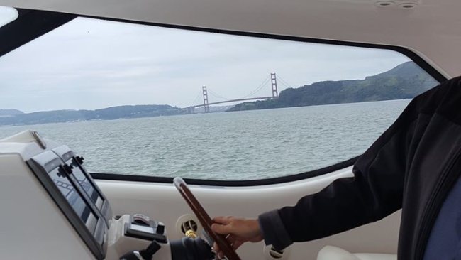 Vicki & client on a sea trial for the 43' Tiara in San Francisco Bay!