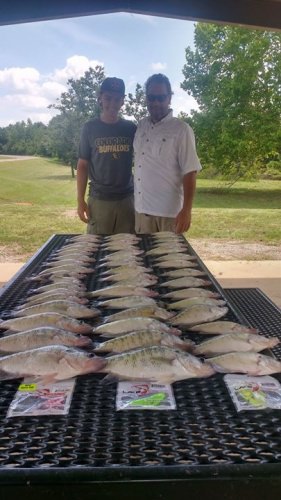 Timothy Walker and his son from Colorado catching some crappie on Lake Eufaula. Loving this low humidity it was a beautiful day to be on the water. #lakeforktackle#the original rod Sox's.