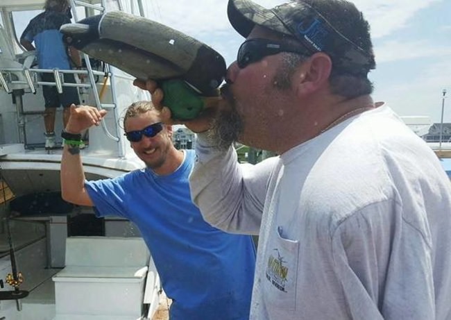Who do you celebrate a successful charter? Chug-A-Duck at Foolish Pleasures Big Game Fishing. Book your fishing adventure with Capt. Dale at www.finandfield.com. #Fishing #FoolishPleasures #Adventure #OCMD #FinandField