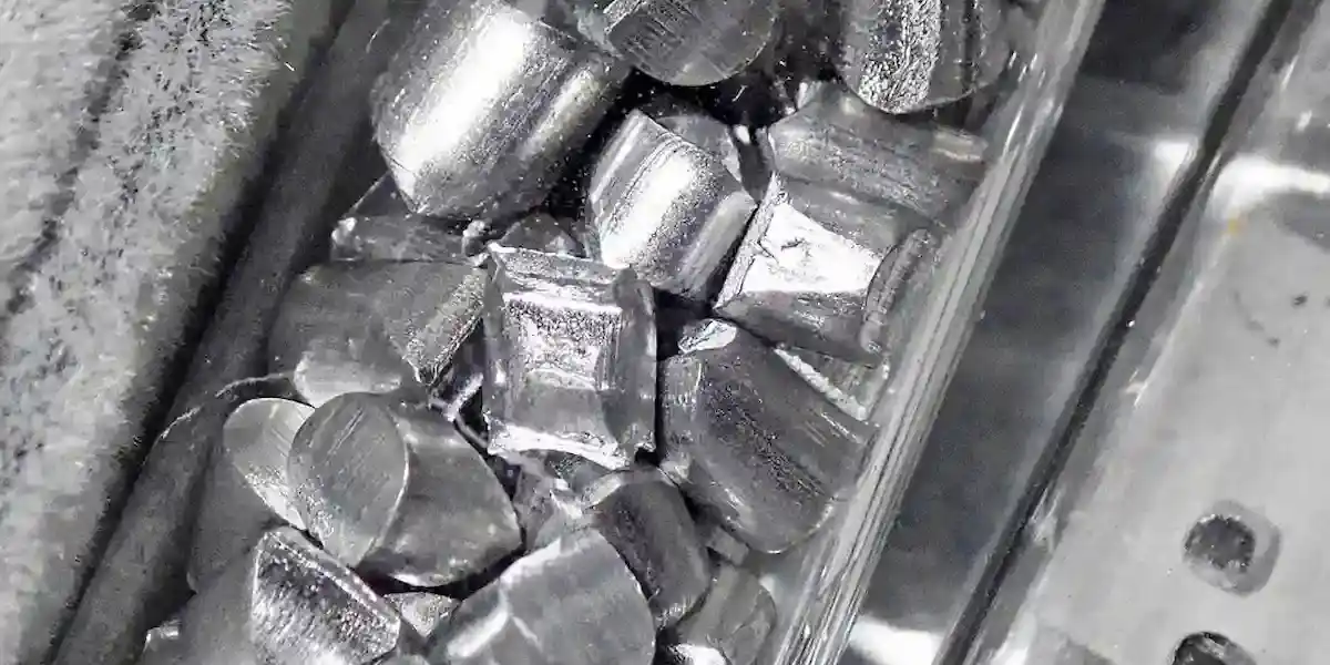 Aluminum ingots in a container, reflecting supply chain reliance on metals amid U.S.-China trade war in 2025.
