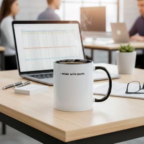 "I Work With Idiots" Mug