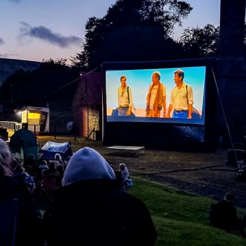 Family Outdoor or Drive In Cinema with Pizza