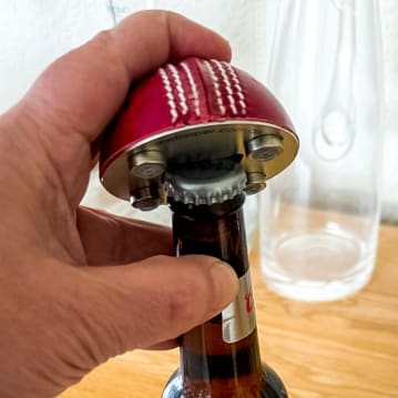 Half Cricket Ball Bottle Opener