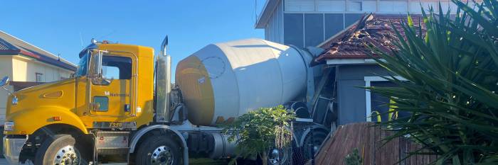 An image relating to the news item Cement truck crashes into house