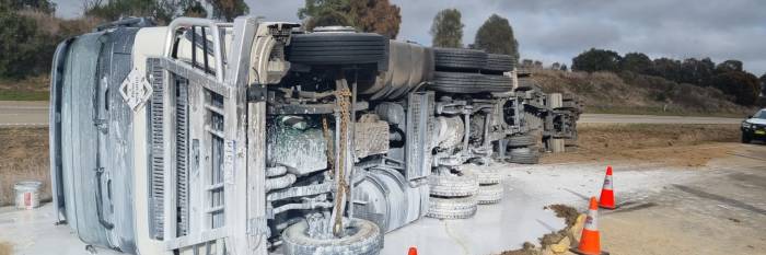 An image relating to the news item Paint mishap on major highway as truck rolls