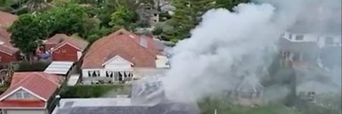 An image relating to the news item Intense fire spreads throughout family home 