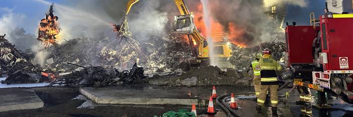 An image relating to the news item Firefighters win marathon battle against scrap yard blaze 