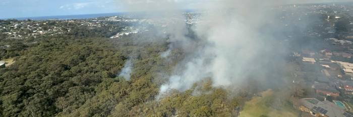 An image relating to the news item ***VISION ALERT*** Fire and Rescue NSW conducts hazard reduction operation on Sydney’s Northern Beaches 