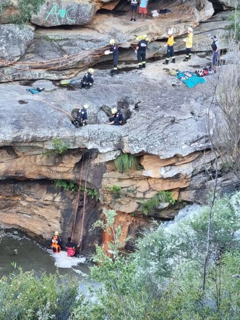 An image relating to the news item Firefighter lowered to rescue man trapped on ledge above Mermaid Pool - Video