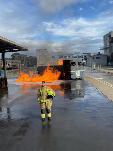 An image relating to the news item Sydney Swans AFLW star kicking goals with Fire and Rescue NSW