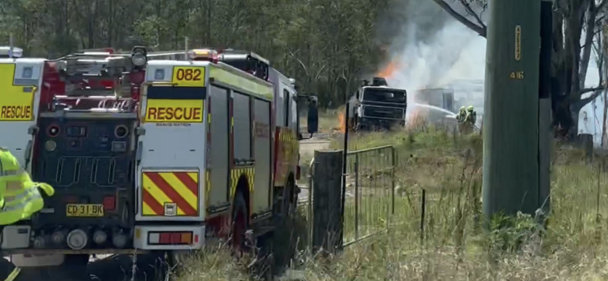 An image relating to the news item Fire and Rescue NSW firefighters extinguish grass fire burning close to homes - VIDEO