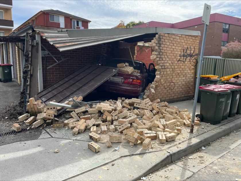 An image relating to the news item Fire and Rescue NSW crews help elderly driver after car crashes into garages - VIDEO