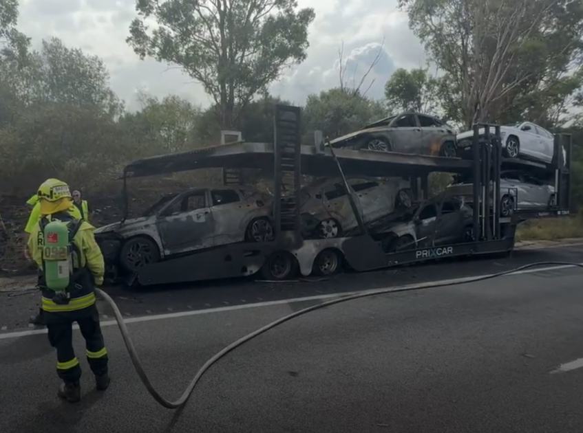 An image relating to the news item Carrier truck fire destroys five cars