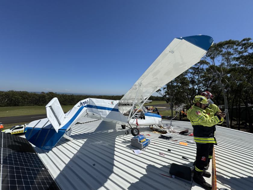 An image relating to the news item Pilot rescued after light plane crashes into hangar