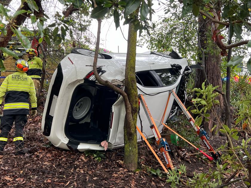 An image relating to the news item Fire and Rescue NSW retrieves injured driver after car rolls down embankment