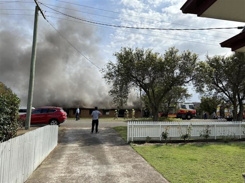 An image relating to the news item Firefighters rescue three people from a house fire 