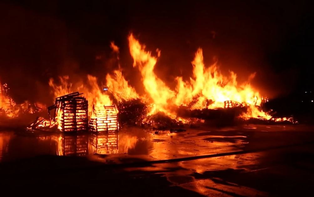 An image relating to the news item Firefighters contain large pallet yard fire 