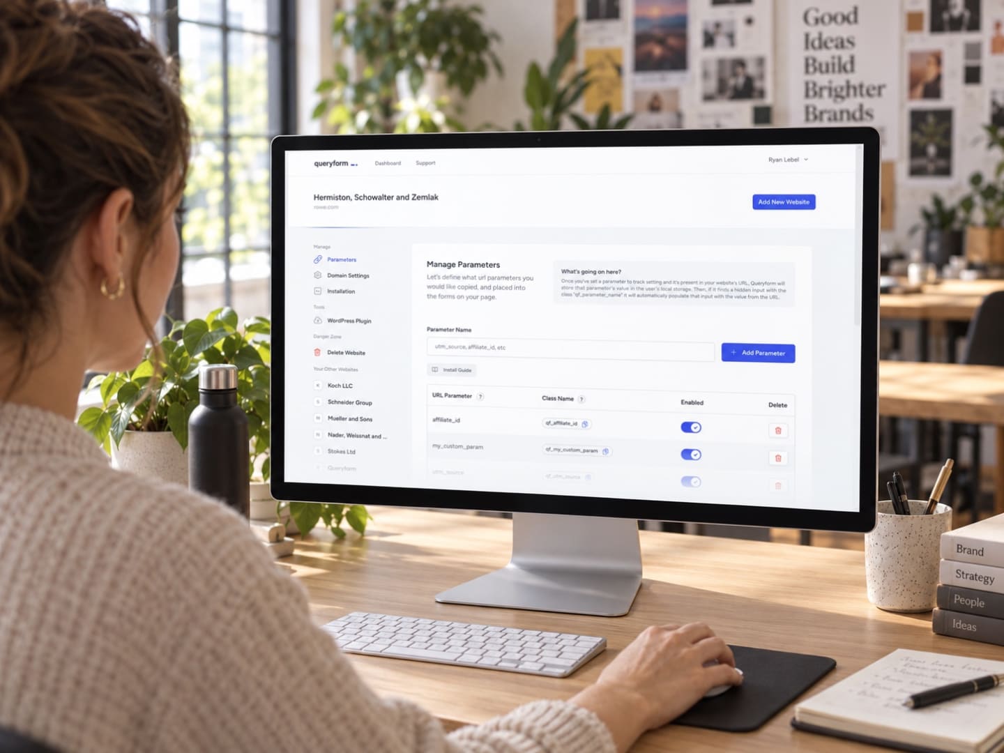 Illustrative scene of a marketing strategist using Queryform on a desktop monitor in a creative agency