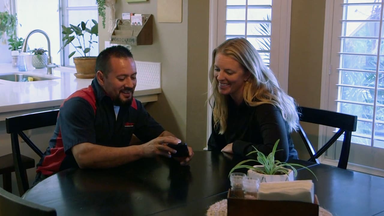 An Allbritten plumber reviews a new water filtration system with this local Fresno homeowner.