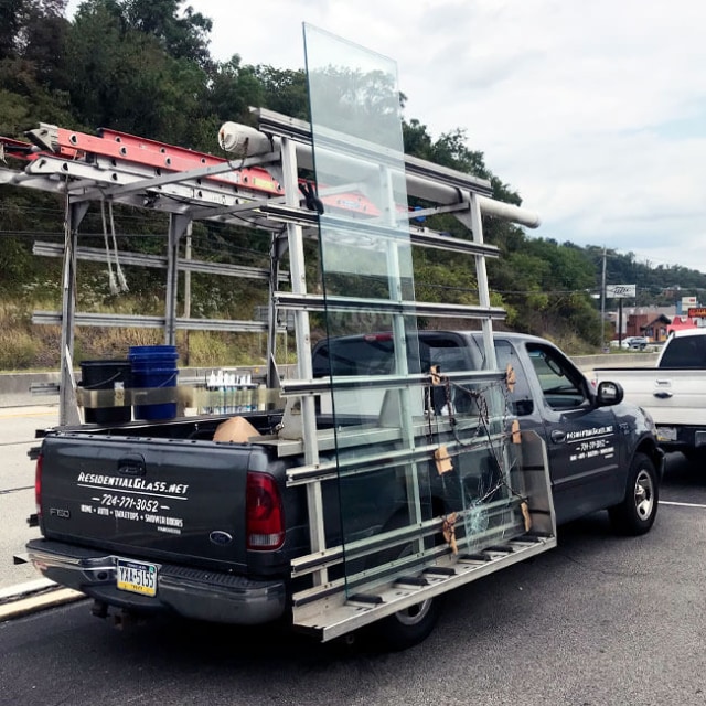 One of our trucks carefully transports a new pane of glass to a local home here in Pittsburgh.