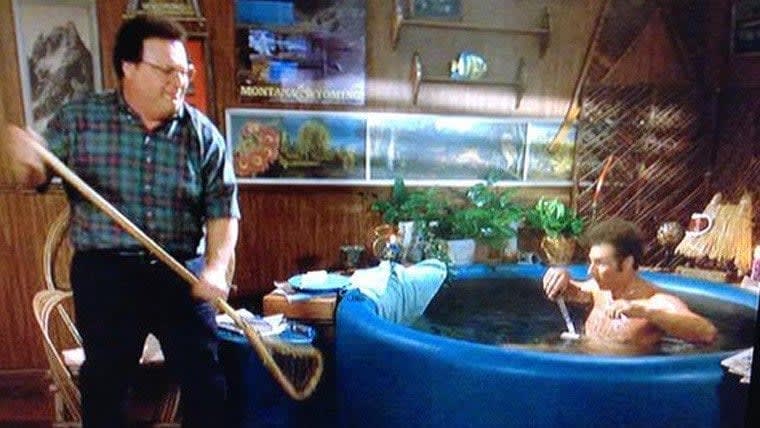 spotted wooden lacrosse stick in seinfold hot tub